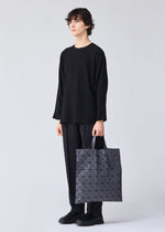 A model wears the Bao Bao Issey Miyake LUCENT MATTE tote bag.