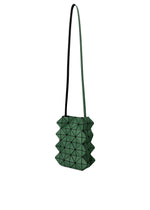 A detail shot of the BAO BAO ISSEY MIYAKE GROWTH shoulder bag.