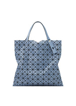 A product shot of the BAO BAO ISSEY MIYAKE PRISM DENIM tote bag in blue.