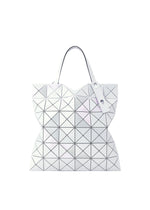 A product shot of the BAOBAO ISSEY MIYAKE LUCENT FLAP tote bag(6*6) in special white (03), recurring_style.
