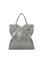 A product shot of the BAOBAO ISSEY MIYAKE LUCENT FLAP tote bag(6*6) in special white (09), recurring_style.