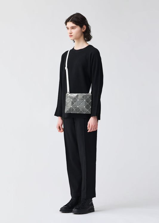 A model wears the BAOBAO ISSEY MIYAKE LUCENT FLAP shoulder bag(3*4).