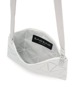 A detail shot of the BAOBAO ISSEY MIYAKE LUCENT FLAP shoulder bag(3*4).