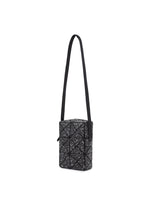 A detail shot of the BAOBAO ISSEY MIYAKE WEEKENDERM shoulder bag.