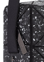 A detail shot of the BAOBAO ISSEY MIYAKE WEEKENDERM shoulder bag.