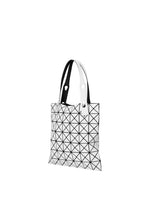 A detail shot of the BAO BAO ISSEY MIYAKE PRISM tote bag.
