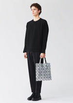 A model wears the BAO BAO ISSEY MIYAKE LUCENT lucent-basics-tote-bag6-6-black.