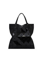 A product shot of the BAO BAO ISSEY MIYAKE LUCENT tote bag in black.