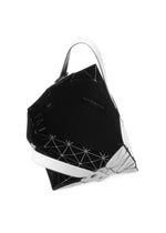 A detail shot of the BAO BAO ISSEY MIYAKE LUCENT tote bag.