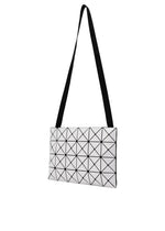 A detail shot of the BAO BAO ISSEY MIYAKE LUCENT shoulder bag.
