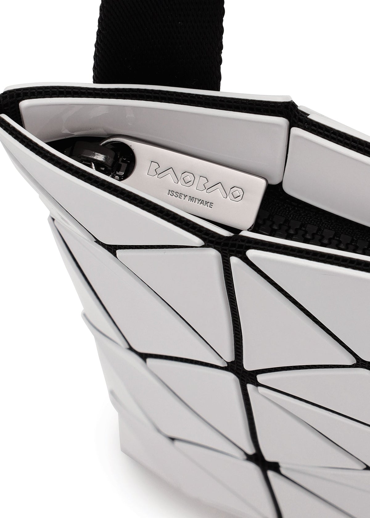 A detail shot of the BAO BAO ISSEY MIYAKE LUCENT shoulder bag.