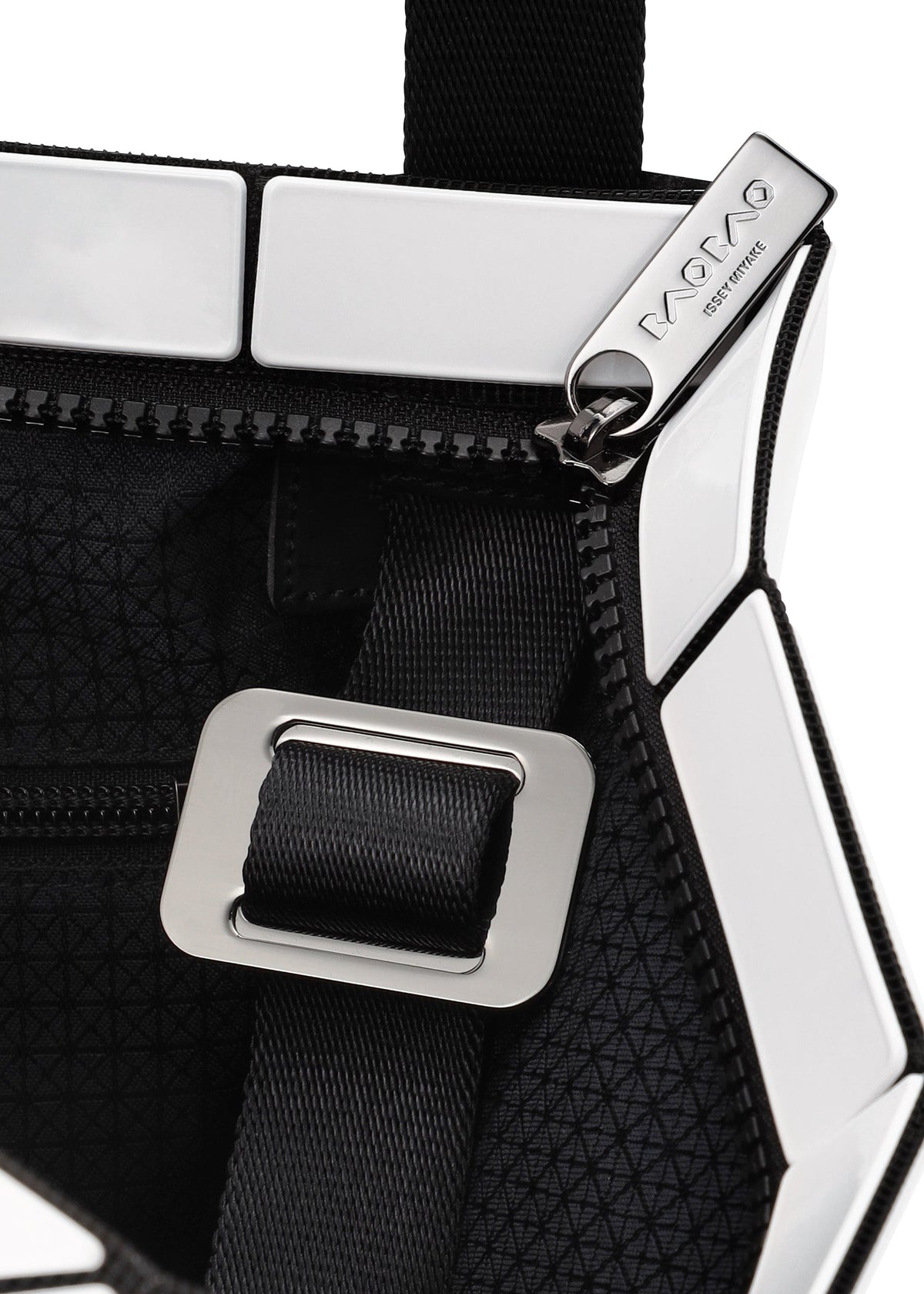 A detail shot of the BAO BAO ISSEY MIYAKE LUCENT shoulder bag.