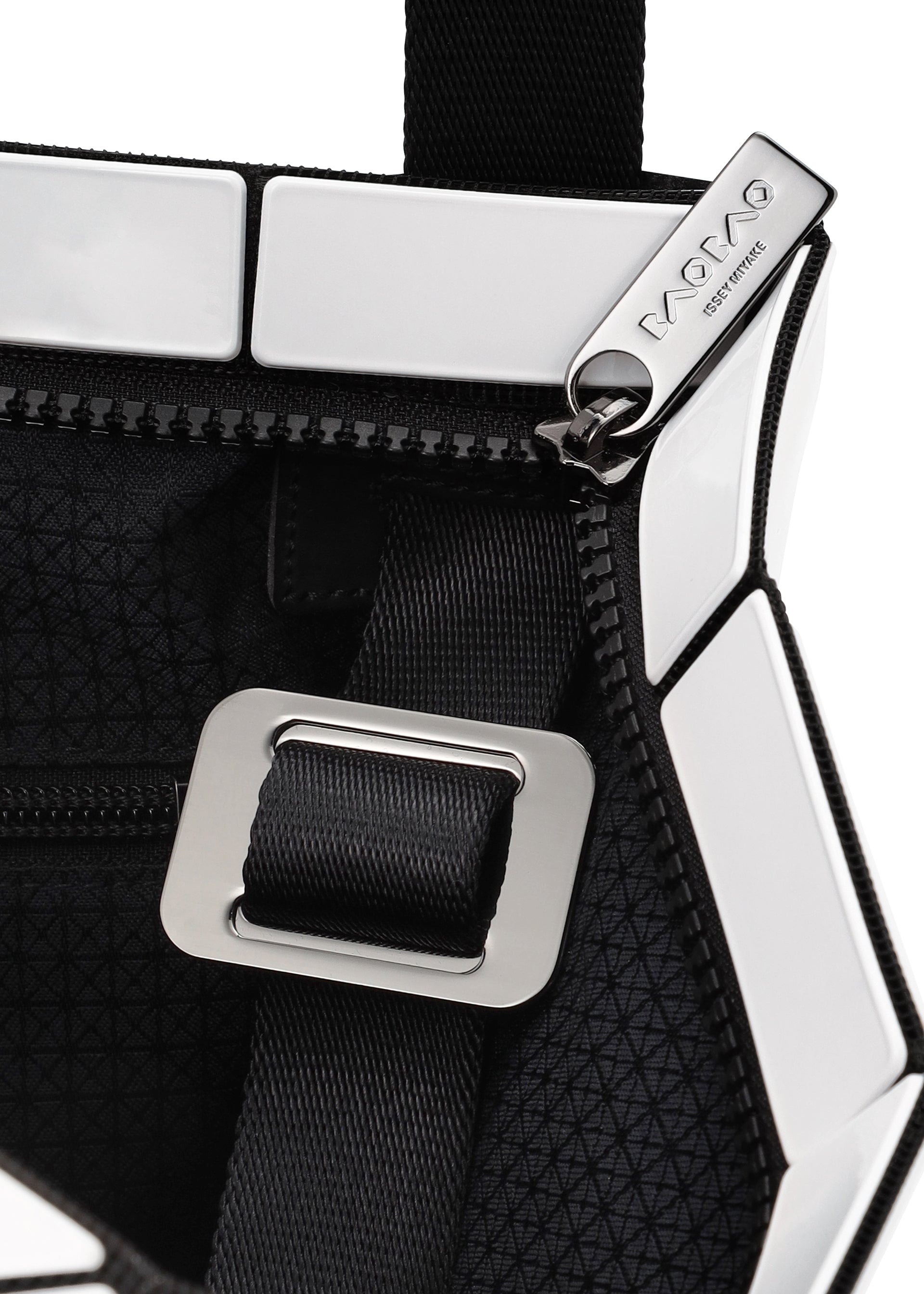 A detail shot of the BAO BAO ISSEY MIYAKE LUCENT shoulder bag.