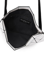 A detail shot of the BAO BAO ISSEY MIYAKE LUCENT shoulder bag.