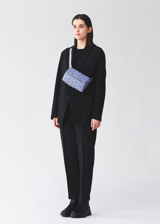 A model wears the BAO BAO ISSEY MIYAKE HEXAGON bag.