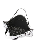 A detail shot of the BAO BAO ISSEY MIYAKE CARTON hand bag.