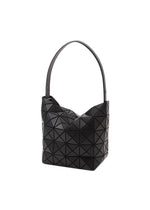 A detail shot of the BAO BAO ISSEY MIYAKE VALLEY hand bag.