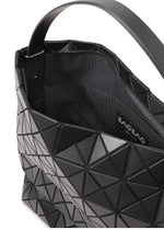 A detail shot of the BAO BAO ISSEY MIYAKE VALLEY hand bag.
