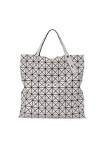A product shot of the BAO BAO ISSEY MIYAKE PRISM MATTE tote bag in light gray.