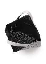 A detail shot of the BAO BAO ISSEY MIYAKE PRISM MATTE tote bag.