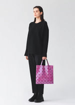 A model wears the BAO BAO ISSEY MIYAKE LUCENT ONE-TONE lucent-one-tone-tote-bag6-blue-grey-7.