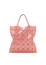 A product shot of the BAO BAO ISSEY MIYAKE LUCENT ONE-TONE tote bag in sunset coral.