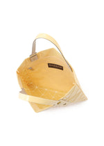 A detail shot of the BAO BAO ISSEY MIYAKE LUCENT ONE-TONE tote bag.