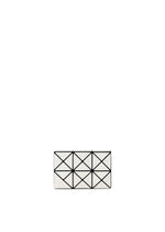 A product shot of the BAO BAO ISSEY MIYAKE TWINKLE wallet in off white.