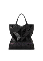 A detail shot of the BAO BAO ISSEY MIYAKE WARP tote bag.