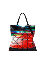 A product shot of the BAO BAO ISSEY MIYAKE WARP tote bag in red mix.