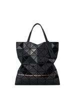 A detail shot of the BAO BAO ISSEY MIYAKE WARP tote bag.