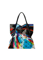 A product shot of the BAO BAO ISSEY MIYAKE WARP tote bag in blue mix.
