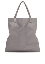 A product shot of the BAO BAO ISSEY MIYAKE TRACK tote bag in gray.