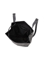 A detail shot of the BAO BAO ISSEY MIYAKE TRACK backpack.