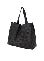 A detail shot of the BAO BAO ISSEY MIYAKE CART tote bag.