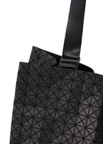 A detail shot of the BAO BAO ISSEY MIYAKE CART tote bag.