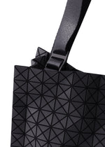 A detail shot of the BAO BAO ISSEY MIYAKE CART MINI tote bag.