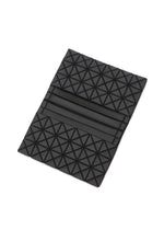 A detail shot of the BAO BAO ISSEY MIYAKE OYSTER card case.