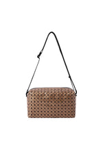 A product shot of the BAO BAO ISSEY MIYAKE SADDLE BAG REFLECTOR shoulder bag in copper brown.