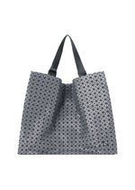 A product shot of the BAO BAO ISSEY MIYAKE CART REFLECTOR tote bag in gunmetal.
