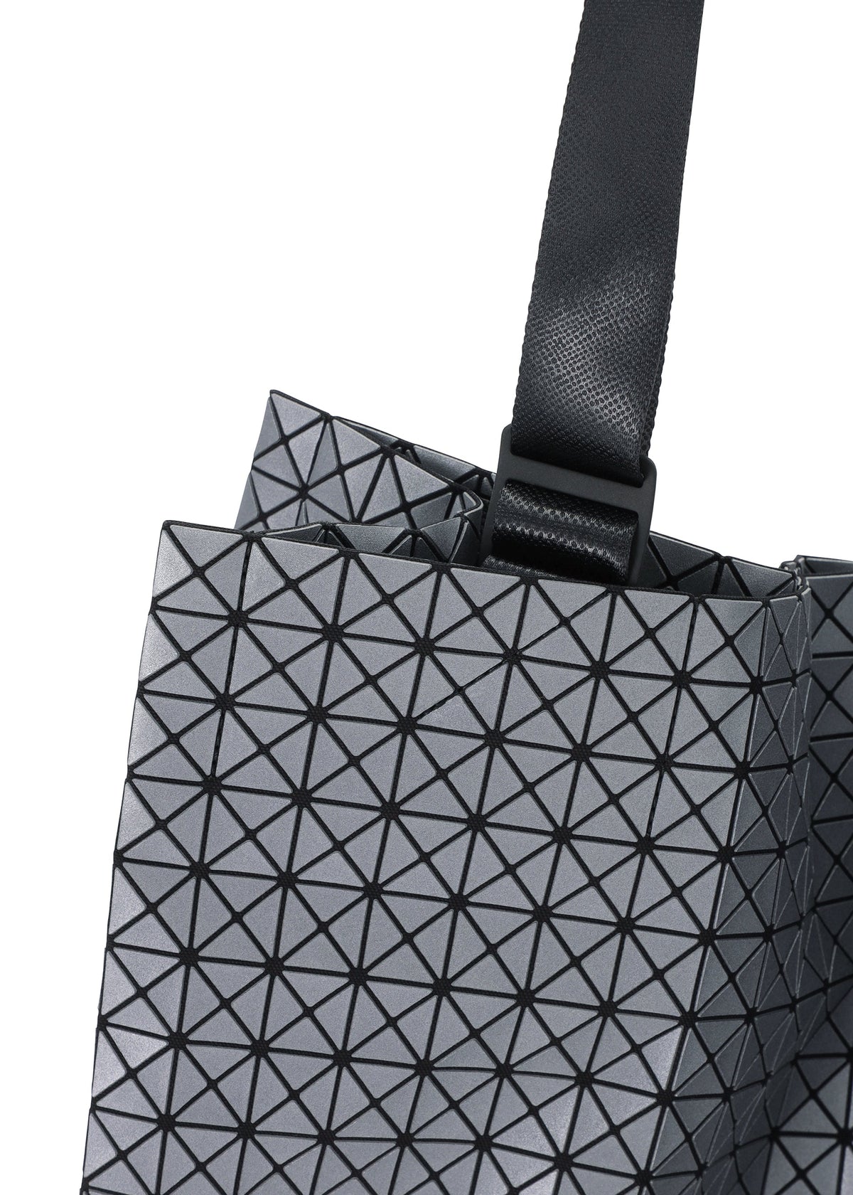 A detail shot of the BAO BAO ISSEY MIYAKE CART REFLECTOR tote bag.