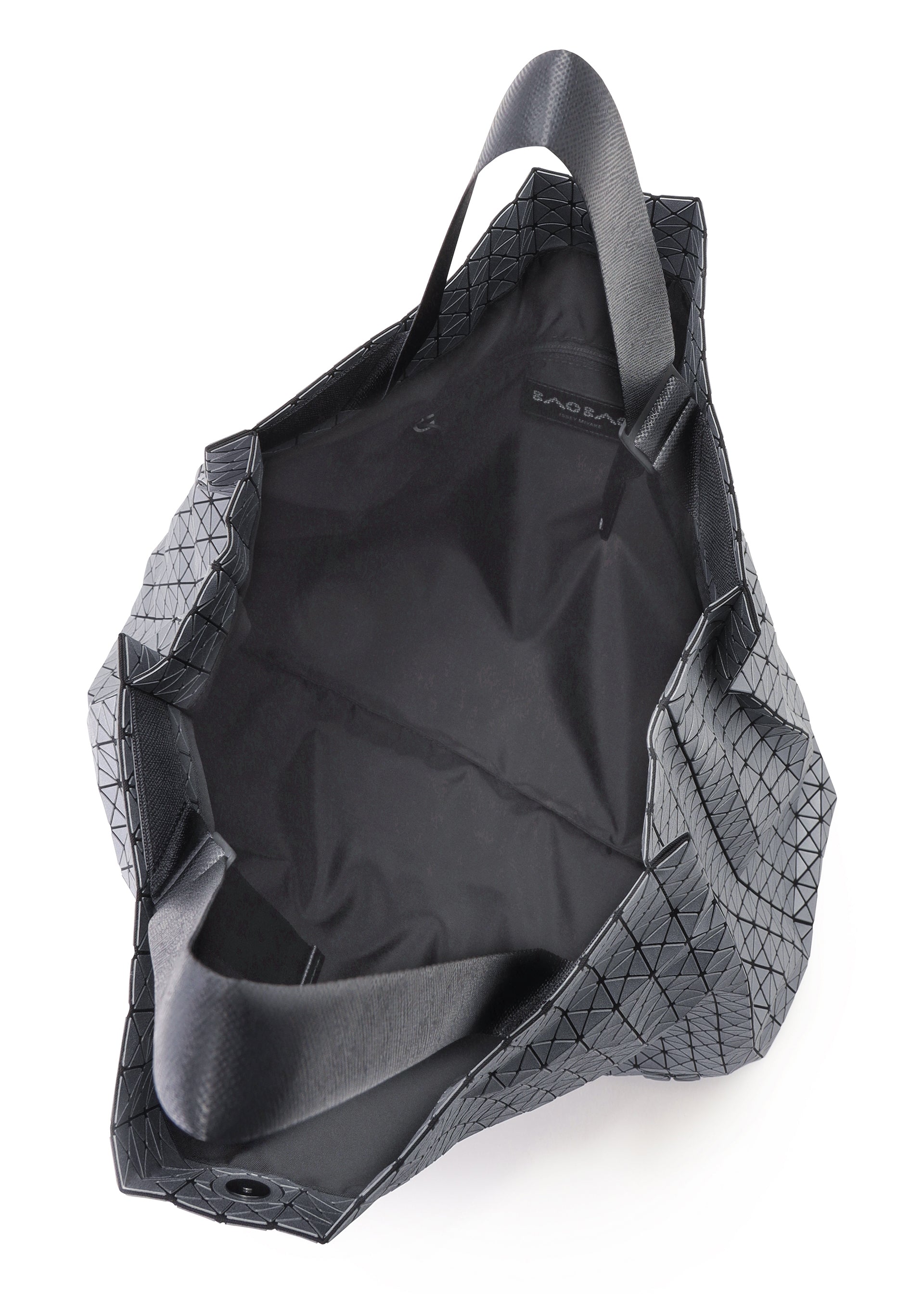 A detail shot of the BAO BAO ISSEY MIYAKE CART REFLECTOR tote bag.