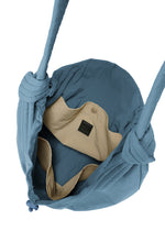 A detail shot of the Good Goods Issey Miyake FUWA FUWA bag.