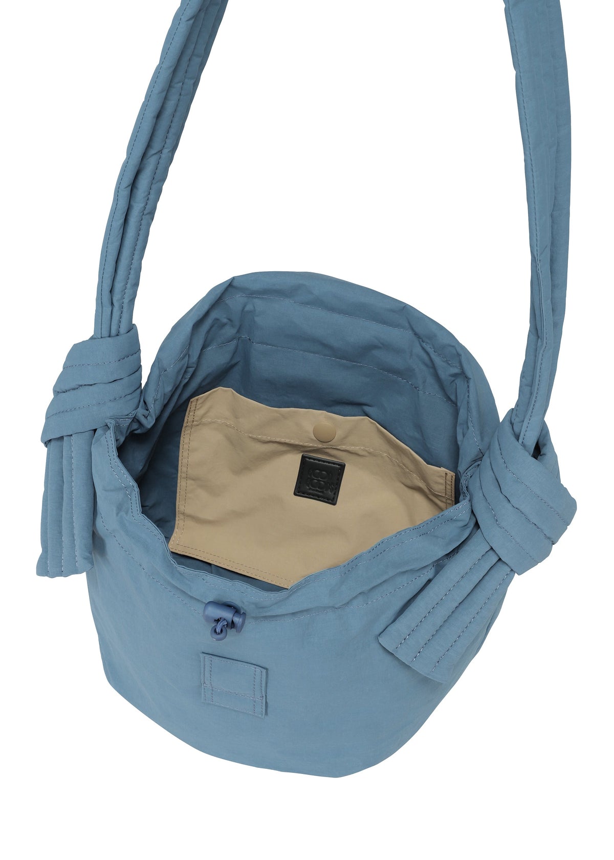 A detail shot of the Good Goods Issey Miyake FUWA FUWA bag.