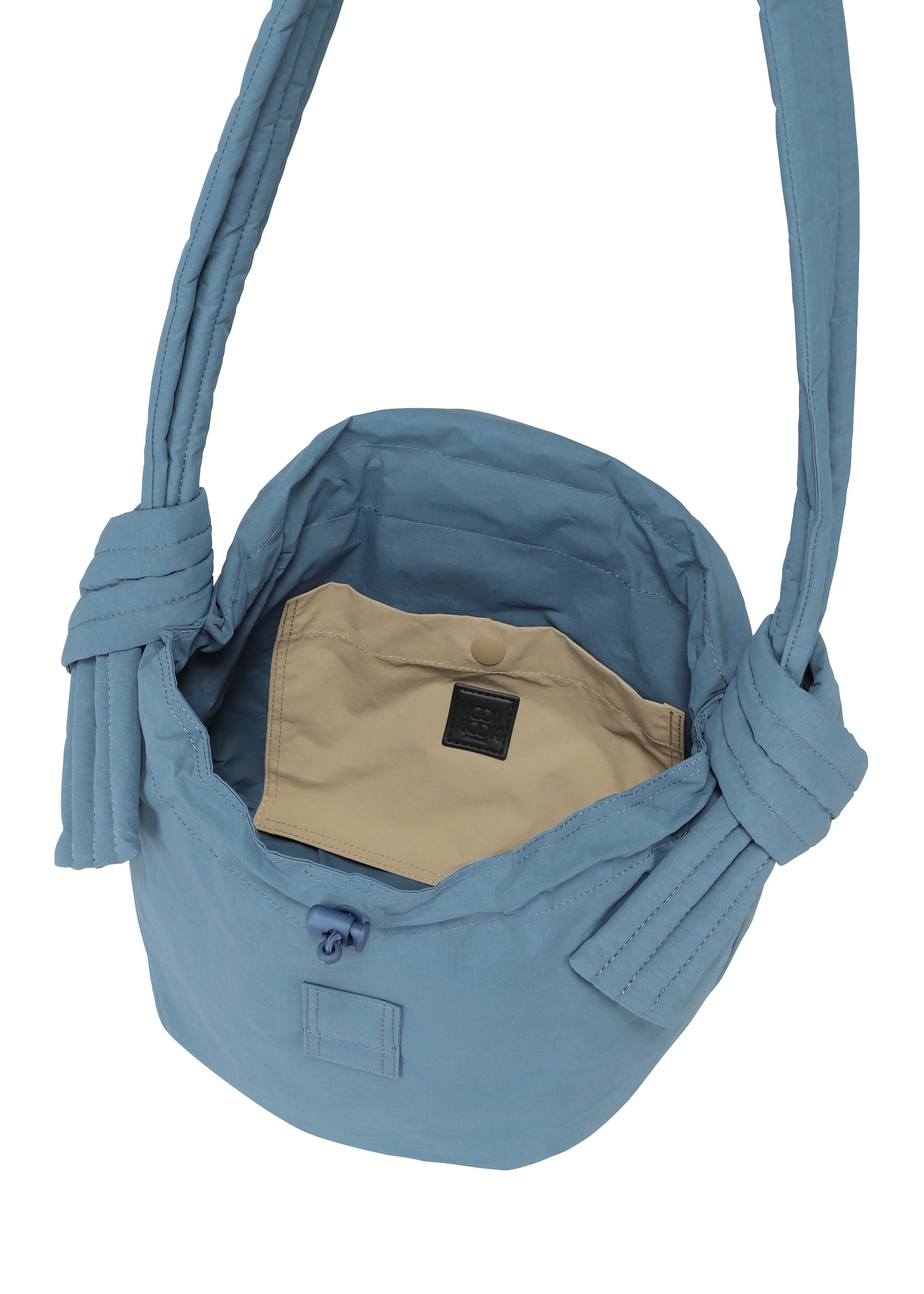 A detail shot of the Good Goods Issey Miyake FUWA FUWA bag.