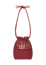 A product shot of the Good Goods Issey Miyake MOKKO BASKET in dark bordeaux x crimson red (82), recurring_style, restock.