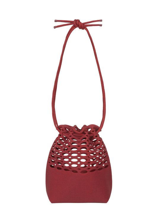 A product shot of the Good Goods Issey Miyake MOKKO BASKET in dark bordeaux x crimson red (82), recurring_style, restock.