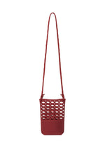 A product shot of the Good Goods Issey Miyake MOKKO BASKET in dark bordeaux x crimson red (82), recurring_style, restock.