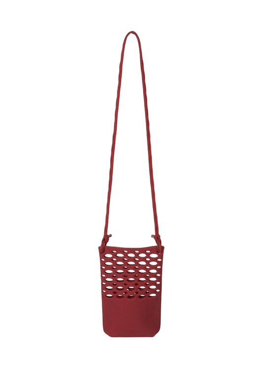 A product shot of the Good Goods Issey Miyake MOKKO BASKET in dark bordeaux x crimson red (82), recurring_style, restock.