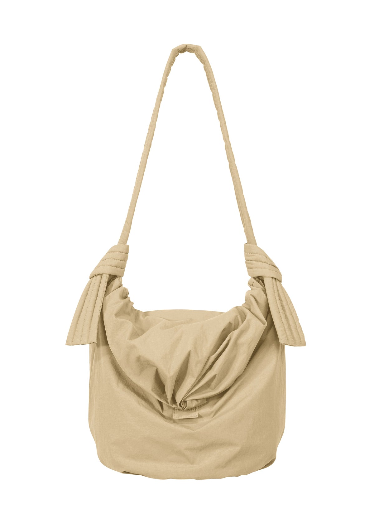 A product shot of the GOOD GOODS ISSEY MIYAKE FUWA FUWA  in beige.